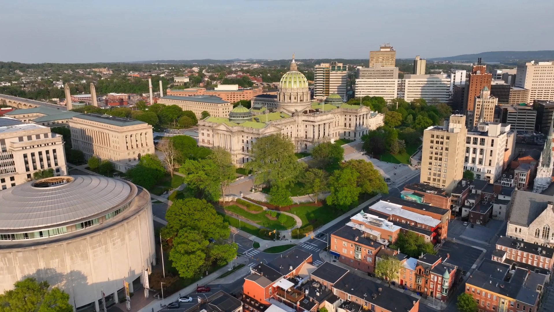 Aerial view of the Pennsylvania State Capitol building and surrounding downtown Harrisburg skyline